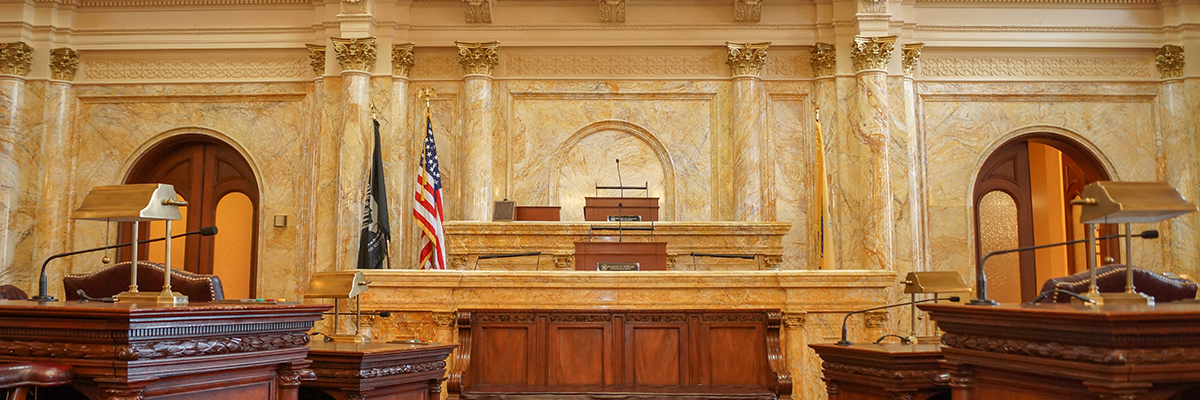 Dias and podium inside the New Jersey State House
