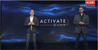 Live video thumbnail of two individuals on a stage giving a presentation